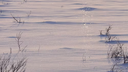 Koskullskulle – Tromsø Ein paar Schneekristalle schwirren in der Luft